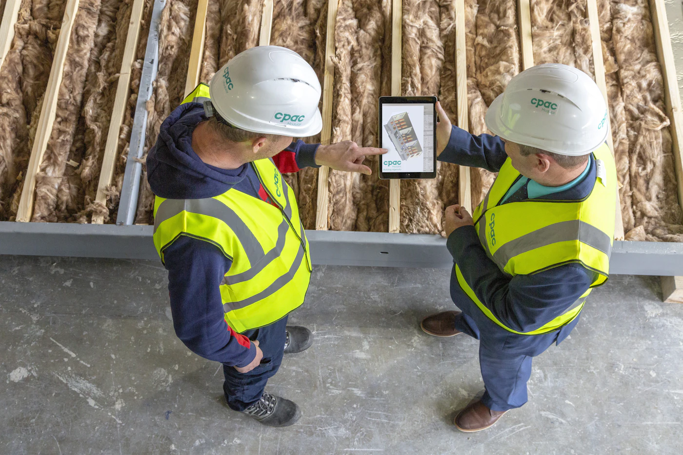 Site engineers reviewing plans