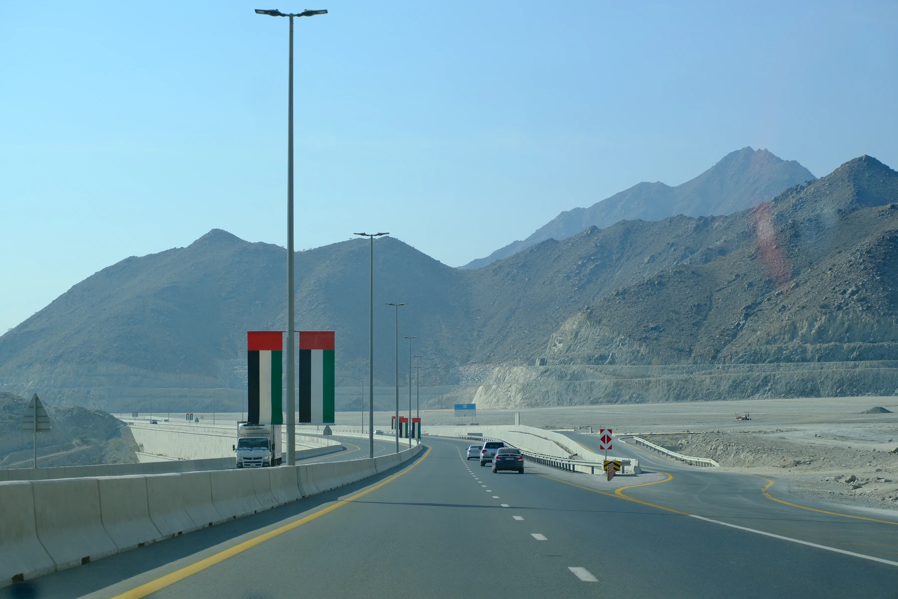 UAE highway with national flags